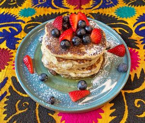 Pancakes.
Fluffy pancakes, generously smothered with juicy mixed berries & generous pour of warm maple syrup, topped powdered sugar. at Dervish in Berlin