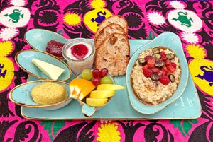 Porridge set.
Comforting set with porridge, topped with colorful berries & maple syrup, chia & granola pudding, cashew cheese, marmelade, vegan butter, fruits and sourdough bread. at Dervish in Berlin