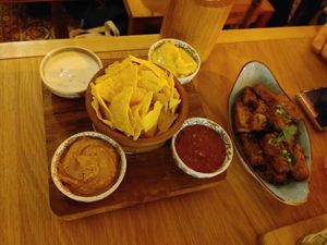 Part of lunch for 4 persons chips and dips at Dervish in Berlin