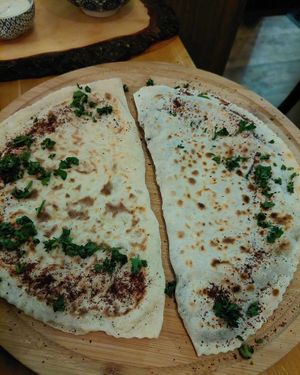 Qutab: Filled flatbread. at Dervish in Berlin