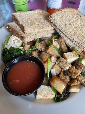Tofu scrambler with vegan sausage  at Cathedral Cafe in Fayetteville