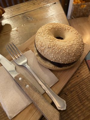 Warm bagel with hummus and eggplant  at The Coffee House in Barcelona