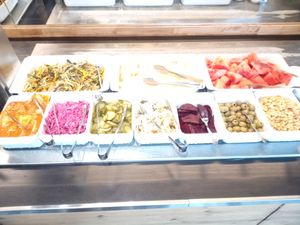 Salad bar and fruit at Sen Việt Vegan Restaurant in Helsinki