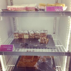 One of the cases of sweets at Napfenyes Cukraszda at Napfenyes Cukraszat - Kiskorona in Budapest