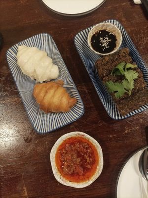Duo mantou and crispy chive cakes at Lhong Khao in Phuket