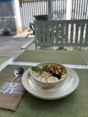 Oatmeal porridge with banana and almonds  at Sweet Secret in Nha Trang