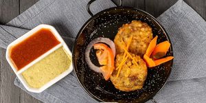 Onion pakora/ onion bhaji 
Vegan  at The Klay Oven Restaurant in Teneriffe