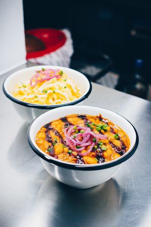 We serve homemade vegan sides as well: baked beans with bbq sauce and (roasted) potato salad. at House of Superfreunde in Norderstedt