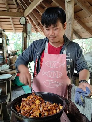 our chef cooking potatoes with earthern pot   at Terra Tree House in Brinchang