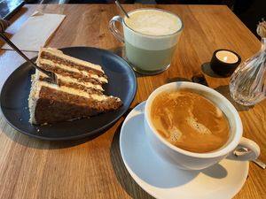 Vegan carrot cake matcha with oat milk and coffee   at Ginger & Gray's Cafe and Diner in Munich