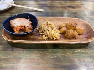 Kimchi, sprouts, sesame potatoes  at Jang Dok Dae in Flushing