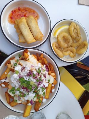 Calamari spring rolls loaded fries at Lil Bao  in Brussels