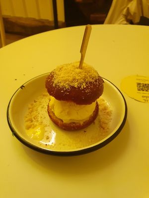 Mango icecream with something similar to a donut dough at Lil Bao  in Brussels