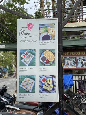 Only the garlic bread is vegan on this picture. The other dishes contains animal products.  at Sữa Cafe in Hoi An