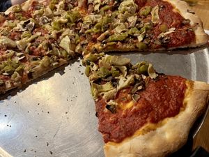 Build your own pizza with artichoke, green chile, mushroom and caramelized onion.   at Three Rivers Pizzeria in Farmington