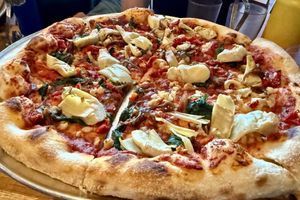 Vegan pizza with artichokes, basil, etc. (ordered without cheese) at Three Rivers Pizzeria in Farmington