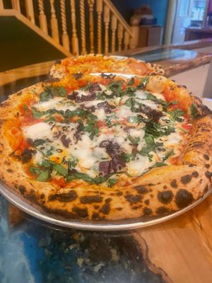 An old one, V for VeganFeta (Ve)

Tomato base, spinach, balsamic caramelised onion, vegano mozzarella and vegano feta at Tegridy Foods in Redcar