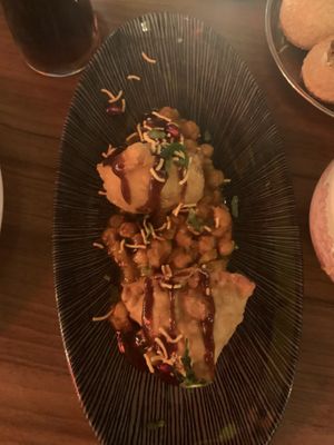 Delicious samosas with chickpeas in a chutney sauce  at Rickshaw & Co in Glasgow