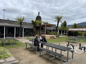 Outdoor are with chess set, good seating inside with log fire  at Tullah Lakeside Lodge in Tullah