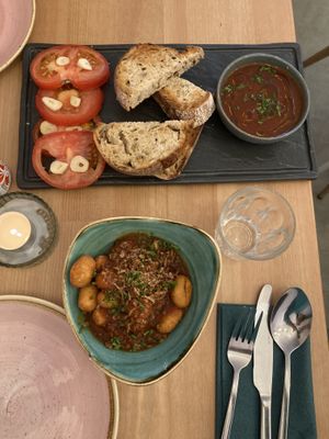 Deep fried Gnocci (bottom) Sourdough w/ tomatoes and garlic (top)  at Pastan Brighton in Brighton