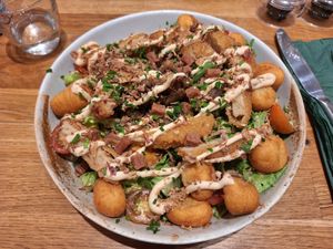 Pulled Shiitake Mushroom Caesar Salad w/ Fried Gnocchi at Pastan Brighton in Brighton