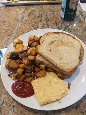 Just Egg patty, potatoes, and toast at The Breakfast Pig in Sault Ste Marie