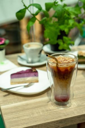 Forest fruits vegan cake and Cherry lover coffee Latte  at Matcha Tsuki in Budapest