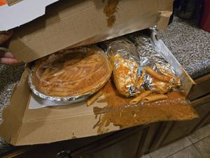 The spill wasn't San Remo's fault! This is the only photo I have. Look how saucy!!!! So good. at San Remo Pizzeria & Restaurant in Ridgewood