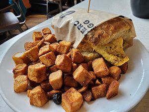 Vegan breakfast sandwich w/ homefries at Square Cafe in Pittsburgh