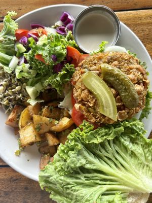 veggie burger (with bun open) - 380Rs  at Lumuma in Varkala
