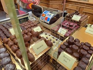 Cherry kirsch and creme vanilla (label blocked by glass but its the lion rampant one) at Chocolatier Van Oost  in Bruges