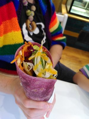 Smashed avo wrap, with pineapple, mango & habanero sauce. at Falafia in Beverley