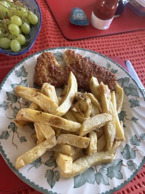 Vegan fish and chips (there was double this amount of chips in the portion - this was as much as I could have on the plate). Really really tasty   at Elland Fish & Chips in Elland