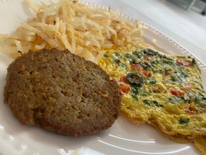 Our Greek omelette with hashbrowns and sausage…all vegan!!! Add our awesome vegan feta cheese!!! So delicious!!! at Lily's Herbs & More in Indialantic