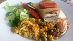Hummus burrito with side salad  at Sky Apple Cafe in Newcastle Upon Tyne