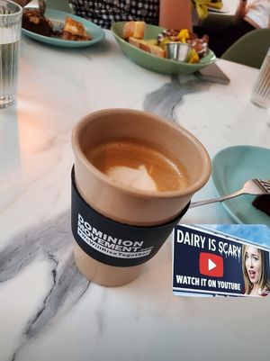 Café con leche de cashews hecha en la casa ("Dairy Is Scary" & "Dominion Movement" both on YouTube) at La Isla in San Juan