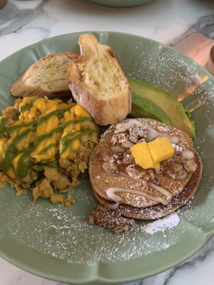 Brunch sampler: Chickpea scramble, sweet potato pancakes, toast and avocado   at La Isla in San Juan