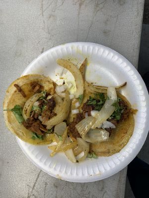 Jackfruit taco with grilled onions, chopped onions, and cilantro   at hippiestacos in Long Beach