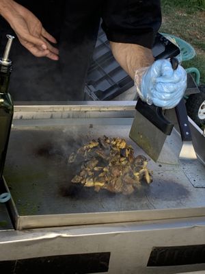 Marinated white mushrooms being cooked   at hippiestacos in Long Beach