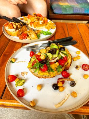 Sourdough breads with pumpkin hummus ans salad. And vegan creamchease tomatoes, mushrooms and tofu  at Lazy Bird in Koh Lanta