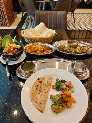 Aloo Jeera, Kachumbar Style Salad, Tandoori Broccoli and plain roti 😋
 at Indus Modern Indian Kitchen in Taguig