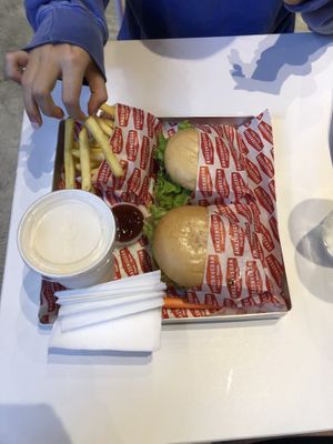 Two double smash burgers and fries with peanut milkshake   at Rightside Fast Food - Mont Kiara in Kuala Lumpur