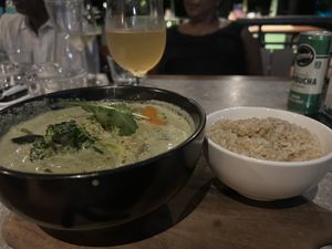 Thai green curry with extra ch!ken pieces  at Privé - Botanic Gardens in Central Singapore