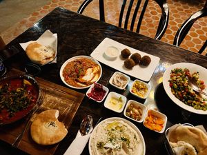 Zaatar hummus, muhumara, falafel, vegan shashuka, Arabic salad and complimentary pickled veg  at Ogen in Hua Hin