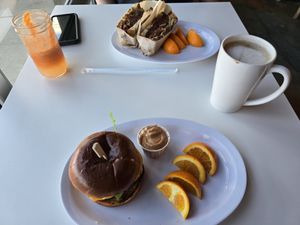 Classic burger, Nutella Latte, Patty Melt and Ginger Sipper juice. Yum! at Urban Beets  in Brown Deer