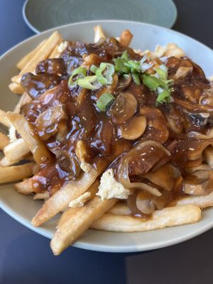 Poutine. Great gravy, not much cheese  at Revelstoke Kitchen & Cafe in Toronto