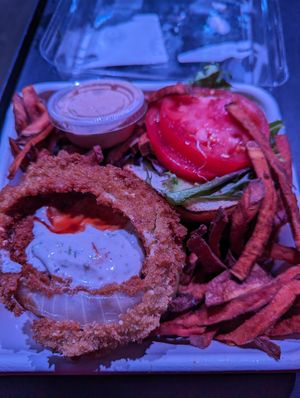 BBQ burger with onion rings and sweet potatoes at Fresh on Crawford in Toronto