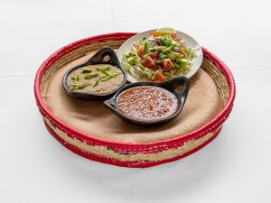 KIK ALICHA: € 17									
Slightly pureed yellow split peas simmered in a mild sauce of onion, curry, and spices. at Awash Valley in The Hague