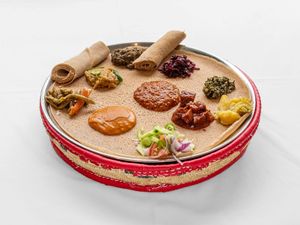 VEGGIE COMBO:  € 20								
Our best vegan combination; Red lintels, yellow spilt, collard green,
cabbage and a combo of peas and lentil sauces
 at Awash Valley in The Hague