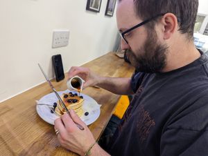 Pancakes with blueberries and syrup at Clwb Coffi in Tonypandy